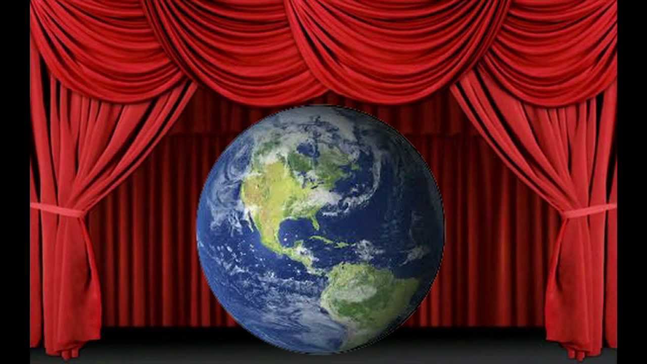 Picture of a 'Globe' on a stage with red Curtains